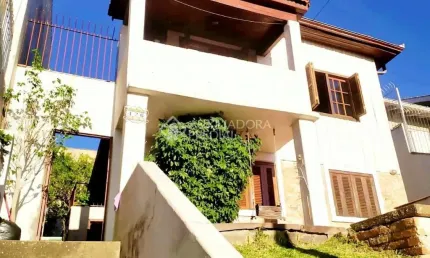 Casa com 3 quartos à venda na Rua Tomaz Edison, 426, Santo Antônio, Porto Alegre, 140 m2 por R$ 362.000