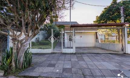 Casa com 3 quartos à venda na Rua Delfino Riet, 287, Santo Antônio, Porto Alegre, 322 m2 por R$ 1.300.000