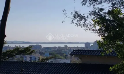 Terreno em condomínio fechado à venda na Avenida Fábio Araújo Santos, 1600, Nonoai, Porto Alegre, 468 m2 por R$ 390.000
