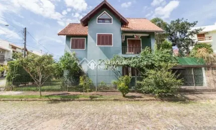 Casa em condomínio fechado com 4 quartos à venda na rua inês vinhas, 40, espírito santo, porto alegre, 220 m2 por r$ 990.000