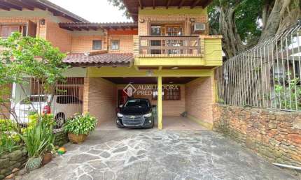 Casa com 3 quartos à venda na Rua José Kanan Aranha, 277, Jardim Isabel, Porto Alegre, 176 m2 por R$ 795.000
