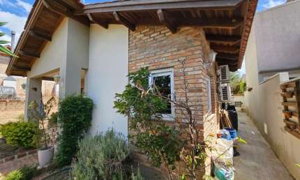 Casa em condomínio fechado com 3 quartos à venda na Tapir Rocha, 6614, São Lucas, Viamão, 148 m2 por R$ 1.149.000