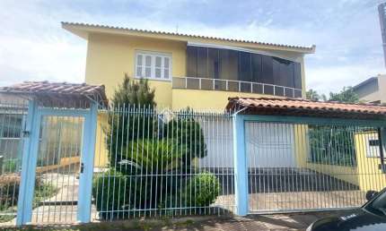 Casa em condomínio fechado com 4 quartos à venda na Rua Cinamomo, 109, São Lucas, Viamão, 269 m2 por R$ 850.000