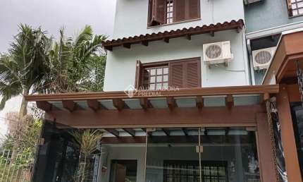 Casa com 3 quartos à venda na Praça Breno Caldas, 242, Jardim Itu Sabará, Porto Alegre, 144 m2 por R$ 680.000