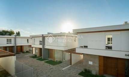 Casa em condomínio fechado com 3 quartos à venda na Avenida Clemenciano Barnasque, 101, Teresópolis, Porto Alegre, 157 m2 por R$ 1.590.000