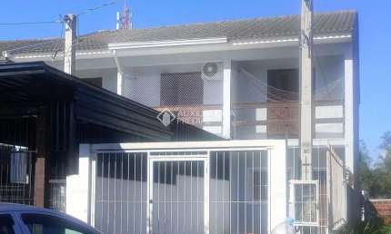 Casa com 2 quartos à venda na Rua Maria Onofrina Mendonça Torres, 104, Mário Quintana, Porto Alegre, 76 m2 por R$ 259.900