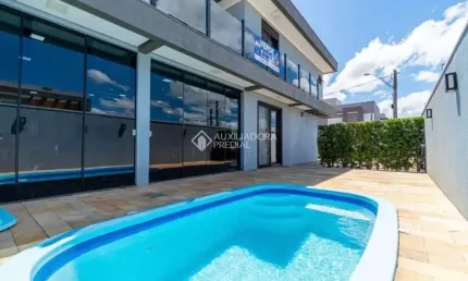 Casa em condomínio fechado com 3 quartos à venda na DAS CEREJEIRAS, 43, Parque da Matriz, Gravataí, 257 m2 por R$ 1.089.000