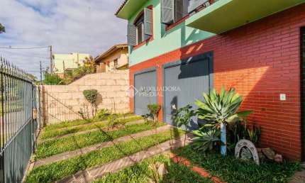Casa com 3 quartos à venda na Avenida Sargento Manoel Raymundo Soares, 161, Jardim Carvalho, Porto Alegre, 265 m2 por R$ 780.000
