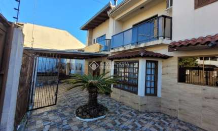 Casa com 4 quartos à venda na Rua Sol Nascente, 34, Lomba do Pinheiro, Porto Alegre, 340 m2 por R$ 750.000