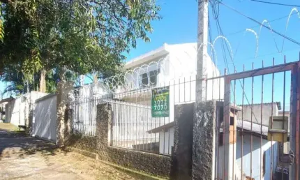 Casa em condomínio fechado com 5 quartos à venda na Rua Tomaz Edison, 99, Santo Antônio, Porto Alegre, 269 m2 por R$ 390.000