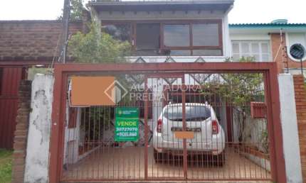 Casa em condomínio fechado com 4 quartos à venda na Rua Veríssimo Rosa, 368, Partenon, Porto Alegre, 120 m2 por R$ 780.000