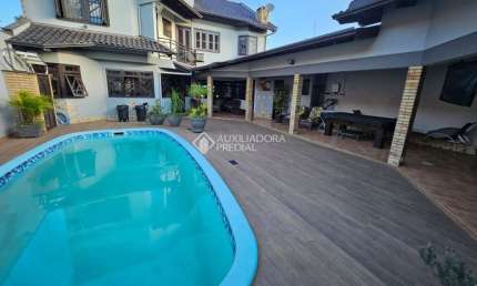 Casa com 3 quartos à venda na Rua João Nicolau, 109, Fátima, Canoas, 344 m2 por R$ 1.700.000