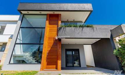 Casa em condomínio fechado com 4 quartos à venda na Rua Rio Camisas, 231, Centro, Xangri-Lá, 220 m2 por R$ 2.100.000
