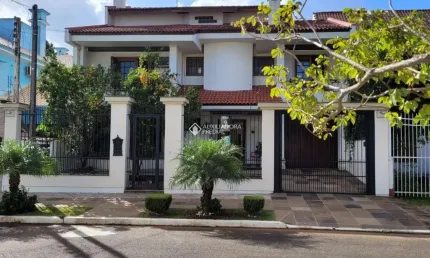 Casa com 6 quartos à venda na Rua Irmão Agnelo Chaves, 170, Marechal Rondon, Canoas, 448 m2 por R$ 1.730.000