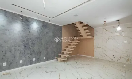 Casa em condomínio fechado com 3 quartos à venda na Rua Padre Anchieta, 151, Nossa Senhora das Graças, Canoas, 121 m2 por R$ 450.000
