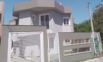 Casa em condomínio fechado com 3 quartos à venda na Rua Buttenbender, 296, Fátima, Canoas, 130 m2 por R$ 499.900