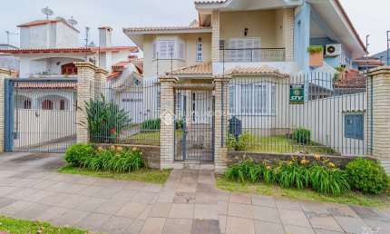 Casa com 4 quartos à venda na Avenida Doutor Sezefredo Azambuja Vieira, 162, Marechal Rondon, Canoas, 335 m2 por R$ 2.100.000