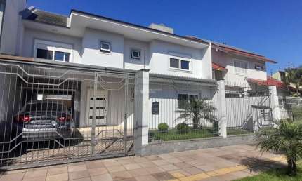Casa com 4 quartos à venda na Rua Gardênia, 89, Estância Velha, Canoas, 250 m2 por R$ 1.600.000