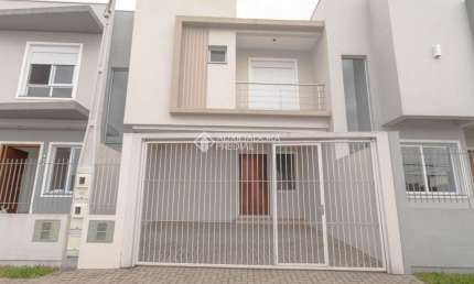 Casa com 3 quartos à venda na FREI HENRIQUE DE COIMBRA, 664, Nossa Senhora das Graças, Canoas, 142 m2 por R$ 594.999