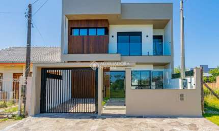 Casa com 5 quartos à venda na LEONEL DE MOURA BRIZOLA, 71, Harmonia, Canoas, 215 m2 por R$ 1.260.000