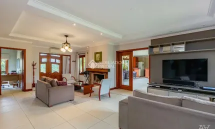 Casa com 4 quartos à venda na Rua País de Gales, 245, Marechal Rondon, Canoas, 600 m2 por R$ 2.544.000