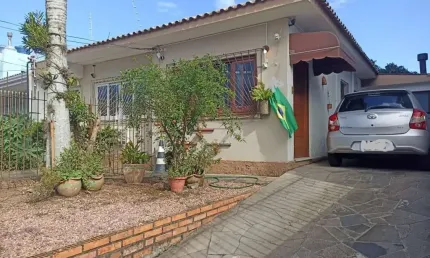 Casa com 5 quartos à venda na Rua General Salustiano, 205, Marechal Rondon, Canoas por R$ 970.000