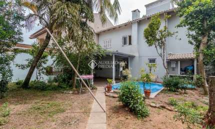 Casa em condomínio fechado com 3 quartos à venda na Rua das Bromélias, 247, Estância Velha, Canoas, 135 m2 por R$ 850.000