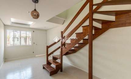 Casa em condomínio fechado com 2 quartos à venda na Avenida Guilherme Schell, 1250, Rio Branco, Canoas, 76 m2 por R$ 275.000