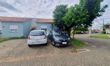 Casa em condomínio fechado com 2 quartos à venda na Irmã Maria Hiltgardis, 376, Olaria, Canoas, 118 m2 por R$ 290.000