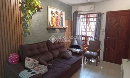 Casa com 2 quartos à venda na Rua Adão da Silva Santos, 1461, São José, Canoas, 67 m2 por R$ 385.000