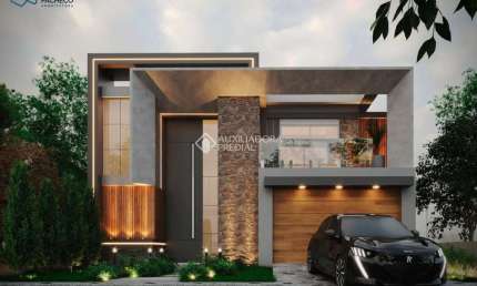 Casa com 4 quartos à venda na Rua Dinamarca, 178, Marechal Rondon, Canoas, 254 m2 por R$ 2.150.000
