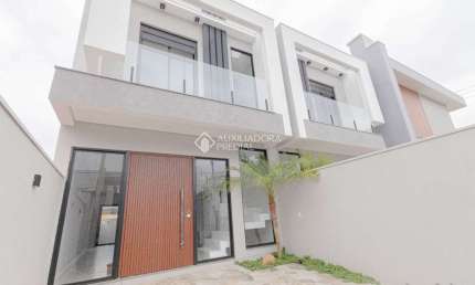 Casa com 3 quartos à venda na Rua Henrique Kranen Filho, 25, Estância Velha, Canoas, 100 m2 por R$ 839.000