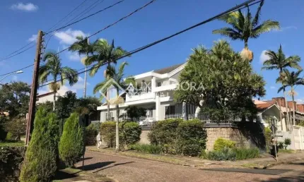 Casa em condomínio fechado com 5 quartos à venda na Rua Desembargador Hugo Candal, 230, Três Figueiras, Porto Alegre, 470 m2 por R$ 2.490.000