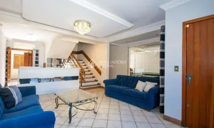 Casa em condomínio fechado com 4 quartos à venda na Rua Santini Longoni, 293, Marechal Rondon, Canoas, 300 m2 por R$ 990.000