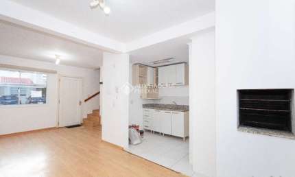 Casa em condomínio fechado com 2 quartos à venda na Rua Aurora, 1100, Marechal Rondon, Canoas, 109 m2 por R$ 569.900