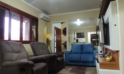 Casa com 3 quartos à venda na Rua Osvaldo Optiz, 522, Estância Velha, Canoas, 154 m2 por R$ 879.000