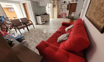 Casa com 3 quartos à venda na Rua Osvaldo Optiz, 522, Estância Velha, Canoas, 154 m2 por R$ 879.000