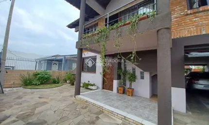 Casa com 4 quartos à venda na Rua Porto Seguro, 534, Nossa Senhora das Graças, Canoas, 261 m2 por R$ 798.000