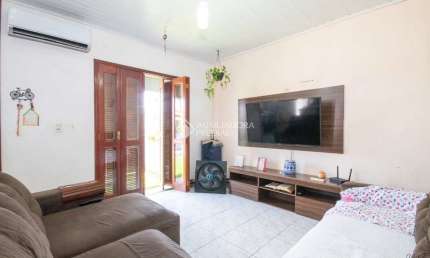 Casa em condomínio fechado com 3 quartos à venda na Rua Camboatás, 947, Igara, Canoas, 80 m2 por R$ 724.000