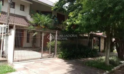 Casa em condomínio fechado com 3 quartos à venda na rua coronel ricardo machado, 79, marechal rondon, canoas, 350 m2 por r$ 1.350.000