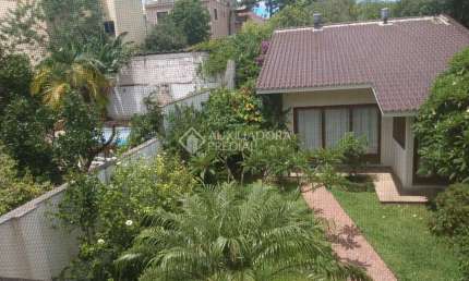 Casa em condomínio fechado com 3 quartos à venda na Rua Coronel Ricardo Machado, 79, Marechal Rondon, Canoas, 350 m2 por R$ 1.350.000