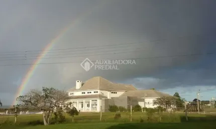 Casa em condomínio fechado com 4 quartos à venda na rua grama azul, 7400, centro, tramandaí, 280 m2 por r$ 1.277.000