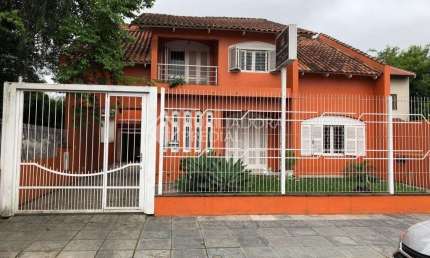Casa em condomínio fechado com 5 quartos à venda na Rua Dom Pedro II, 622, Nossa Senhora das Graças, Canoas, 258 m2 por R$ 1.537.000