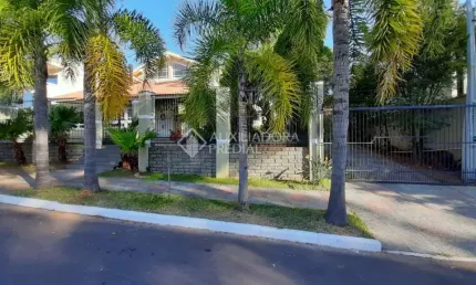 Casa em condomínio fechado com 5 quartos à venda na Rua País de Gales, 41, Marechal Rondon, Canoas, 333 m2 por R$ 2.500.000