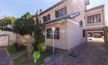 Casa em condomínio fechado com 3 quartos à venda na Rua Boa Esperança, 1145, Rio Branco, Canoas, 243 m2 por R$ 1.064.000