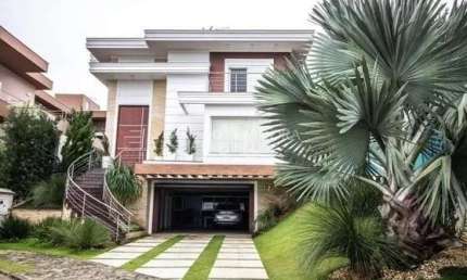 Casa em condomínio fechado com 3 quartos à venda na Avenida Santos Ferreira, 3125, Marechal Rondon, Canoas, 420 m2 por R$ 3.190.000