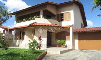 Casa em condomínio fechado com 3 quartos à venda na Rua Tamoio, 2292, Niterói, Canoas, 240 m2 por R$ 950.000