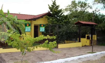 Casa em condomínio fechado com 3 quartos à venda na Rua Vinícius de Moraes, 174, Marechal Rondon, Canoas, 175 m2 por R$ 890.000