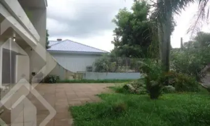 Casa em condomínio fechado com 5 quartos à venda na Rua Santa Terezinha, 286, Nossa Senhora das Graças, Canoas, 372 m2 por R$ 750.000