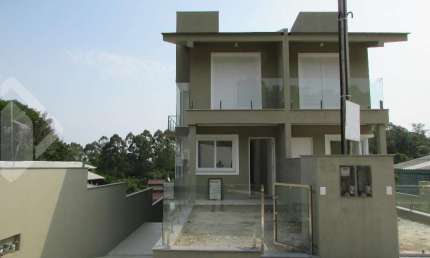 Casa em condomínio fechado com 3 quartos à venda na B, 451, Centro, Nova Santa Rita, 130 m2 por R$ 499.000